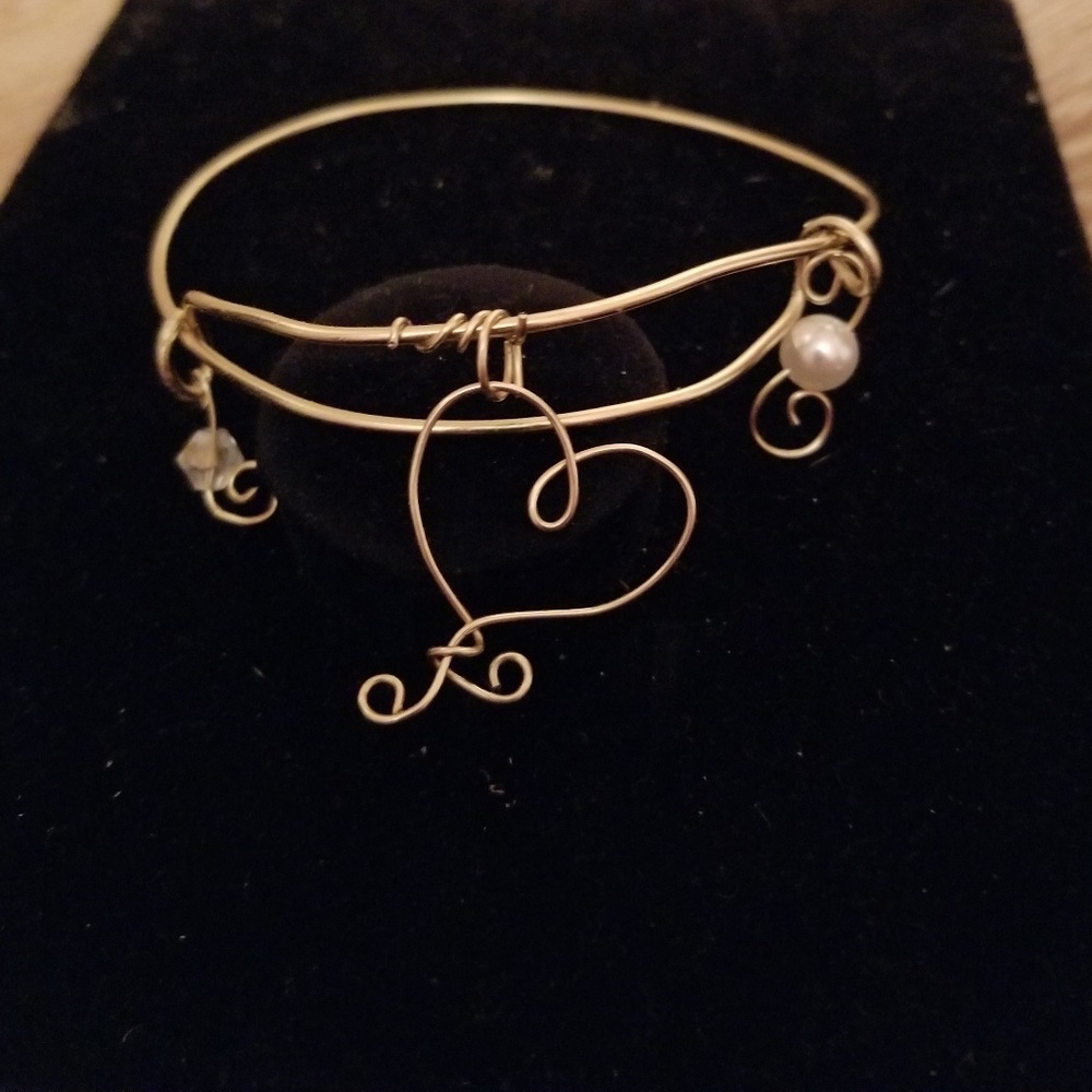 Bangle bracelet with charms